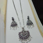 Shimmering Silver Oxidized Jewelry Set with Intricate Floral Design and Jhumka Earrings